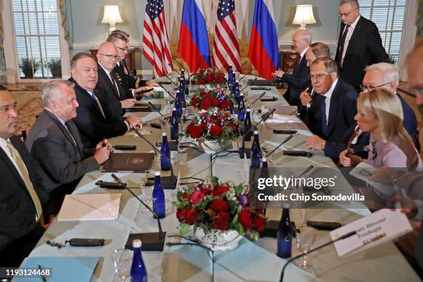 Secretary of State Mike Pompeo and his counterpart Russian Foreign Minister Sergey Lavrov sit down for a meeting in the Jefferson Room at the State...