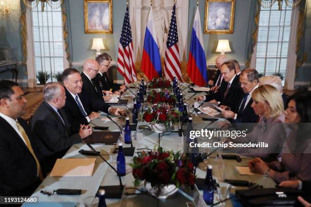 Secretary of State Mike Pompeo and his counterpart Russian Foreign Minister Sergey Lavrov sit down for a meeting in the Jefferson Room at the State...