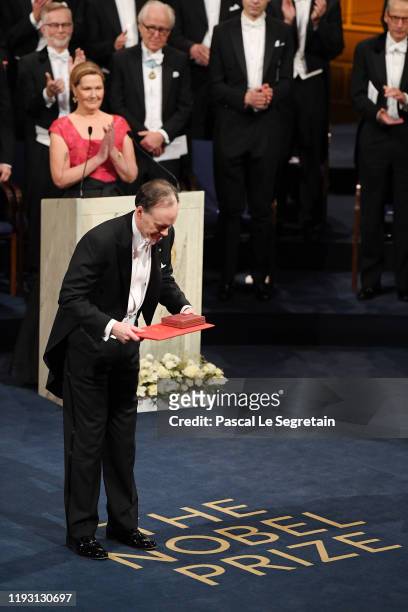 Professor William G. Kaelin Jr, laureate of the Nobel Prize in Medicine acknowledges applause after he received his Nobel Prize from King Carl XVI...
