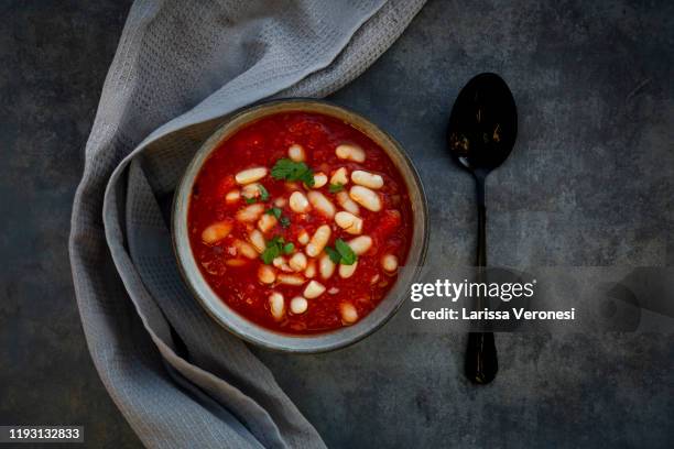 bowl of stew with cannellini beans - kidney bean stock pictures, royalty-free photos & images