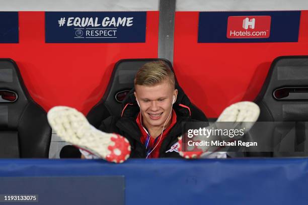 Erling Braut Haaland of RB Salzburg looks on from the bench as players inspect the pitch ahead of the UEFA Champions League group E match between RB...