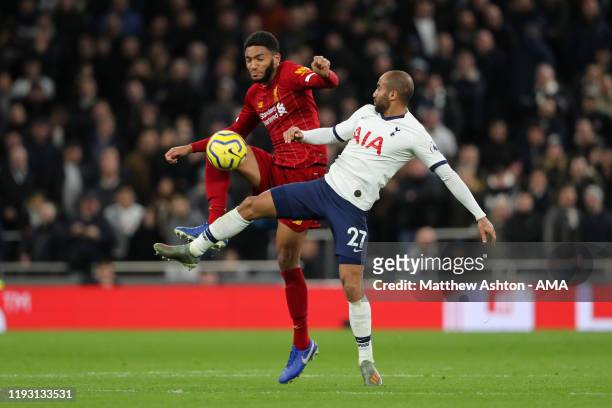 Joe Gomez of Liverpool and Lucas Moura of Tottenham Hotspur during the Premier League match between Tottenham Hotspur and Liverpool FC at Tottenham...