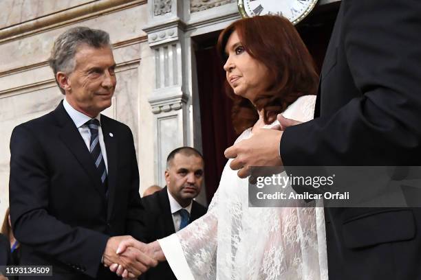 Outgoing President of Argentina Mauricio Macri greets Argentina Vice President-elect Cristina Fernández de Kirchner during the Presidential...