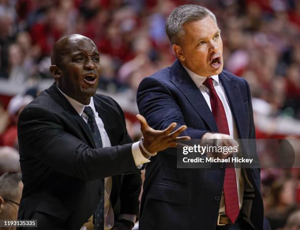 Assistant coach Terry Johnson and Head coach Chris Holtmann of the Ohio State Buckeyes are seen during the first half against the Indiana Hoosier at...