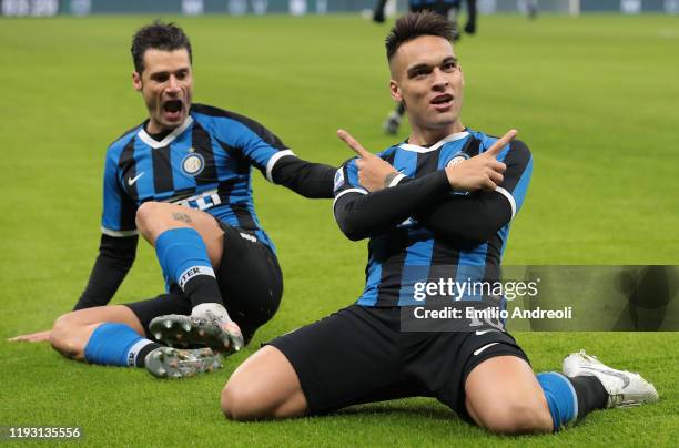 Lautaro Martinez of FC Internazionale celebrates with his team-mate Antonio Candreva after scoring the opening goal during the Serie A match between...