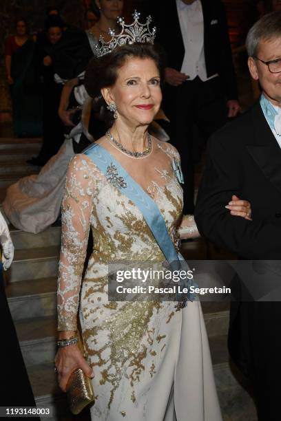 Queen Silvia of Sweden arrives at the Nobel Prize Banquet 2018 at City Hall on December 10, 2019 in Stockholm, Sweden.