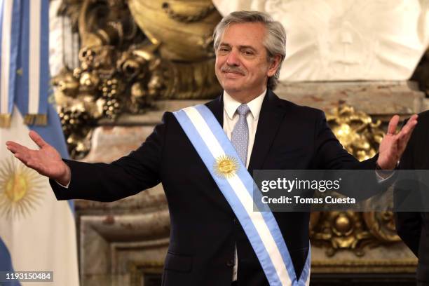 President of Argentina Alberto Fernandez smiles during the reception of foreign leaders at Salon Blanco of Casa Rosada Government Palace on December...