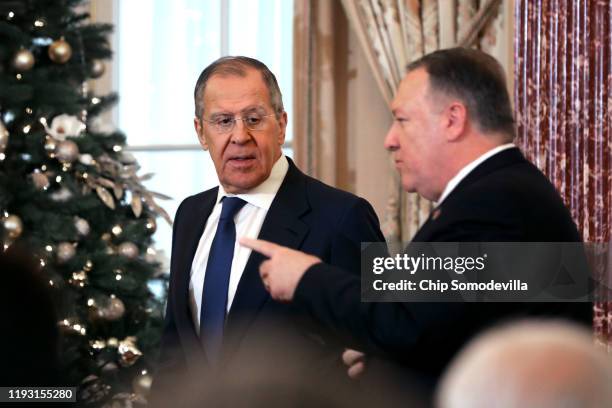 Russian Foreign Minister Sergey Lavrov and U.S. Secretary of State Mike Pompeo leave a joint news conference in the Franklin Room at the State...