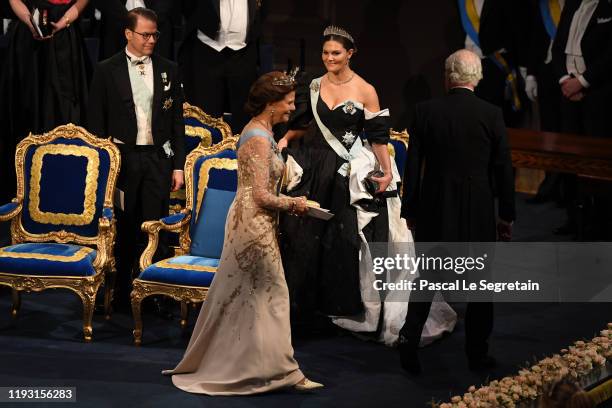 Prince Daniel of Sweden, Queen Silvia of Sweden and Crown Princess Victoria of Sweden and King Carl XVI Gustaf of Sweden attend the Nobel Prize...