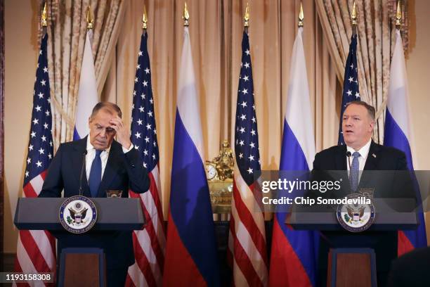 Russian Foreign Minister Sergey Lavrov and U.S. Secretary of State Mike Pompeo hold a joint news conference in the Franklin Room at the State...