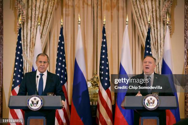 Russian Foreign Minister Sergey Lavrov and U.S. Secretary of State Mike Pompeo hold a joint news conference in the Franklin Room at the State...