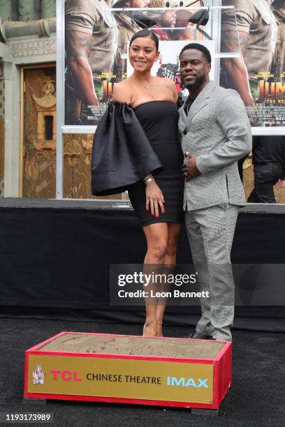 Kevin Hart poses with his wife Eniko Parrish as he is honored with a Hand and Footprint ceremony at the TCL Chinese Theatre IMAX on December 10, 2019...
