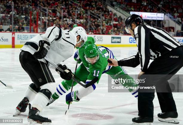 Jordan Staal of the Carolina Hurricanes and Anze Kopitar of the Los Angeles Kings prepare for the face-off during an NHL game on January 11, 2020 at...