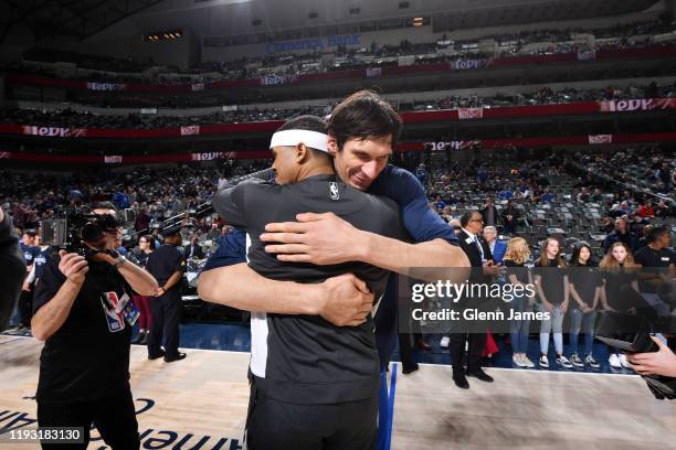 Boban Marjanovic of the Dallas Mavericks and Tobias Harris of the Philadelphia 76ers hug before the game on January 11, 2020 at the American Airlines...