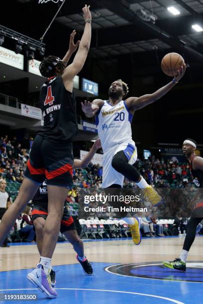 Jeremy Pargo of the Santa Cruz Warriors drives on Moses Brown of the Texas Legends during the second quarter on January 11, 2020 at Comerica Center...