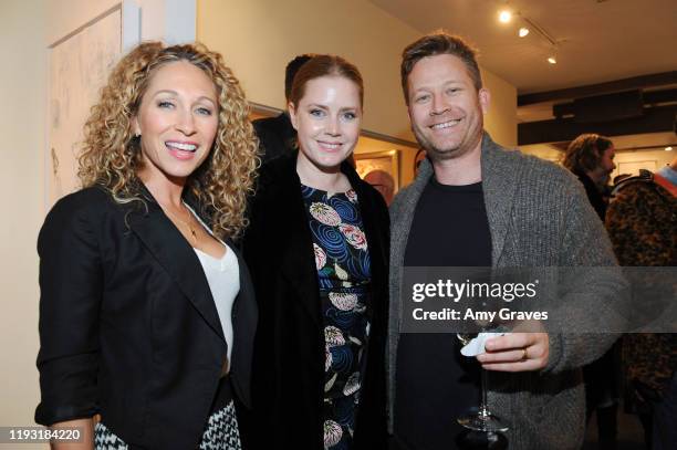 Katie Daryl, Amy Adams and Eddie Adams attend the Trigg Ison Fine Art In Association With Krista Smith And Sam Taylor-Johnson Present Darren Legallo...
