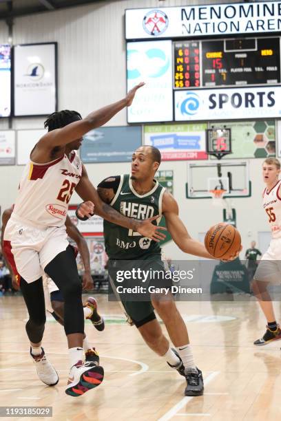 Cameron Reynolds of the Wisconsin Herd drives against the Canton Charge during an NBA G-League game on January 11, 2020 at Menominee Nation Arena in...