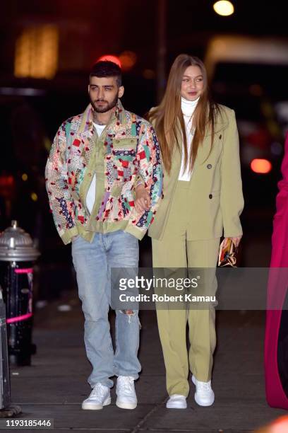 Gigi Hadid and Zayn Malik show PDA after leaving a restaurant in NoHo celebrating a birthday on January 11, 2020 in New York City.
