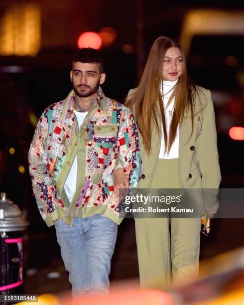 Gigi Hadid and Zayn Malik show PDA after leaving a restaurant in NoHo celebrating a birthday on January 11, 2020 in New York City.