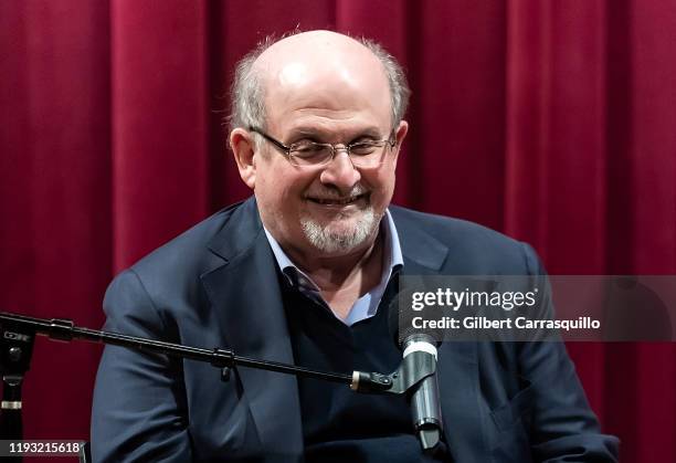 Novelist Salman Rushdie speaks on stage during a discussion of the book "Quichotte" at Free Library of Philadelphia on December 10, 2019 in...