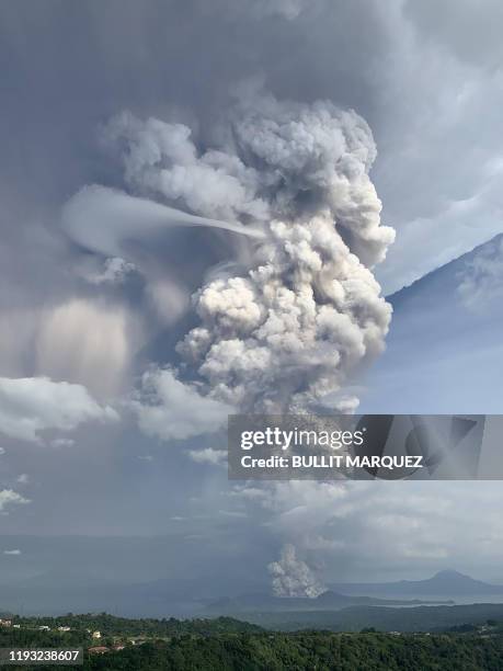 Phreatic explosion from the Taal volcano is seen from the town of Tagaytay in Cavite province, southwest of Manila, on January 12, 2020.