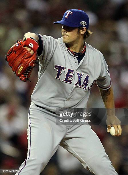 American League All-Star C.J. Wilson of the Texas Rangers throws a pitch in the fourth inning of the 82nd MLB All-Star Game at Chase Field on July...