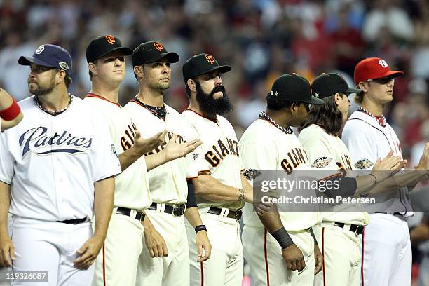 National League All-Star Brian Wilson of the San Francisco Giants stands with National League All-Star teammates before the start of the 82nd MLB...
