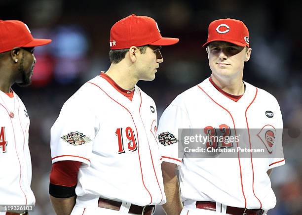 National League All-Star Joey Votto of the Cincinnati Reds talks with National League All-Star Jay Bruce of the Cincinnati Reds before the start of...