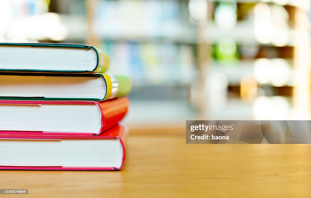 Book Stack Getty Stack Of Books On The Table Of Public Library High-Res Stock Photo ...