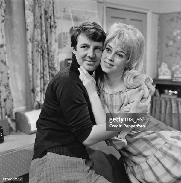 English actors Philip Lowrie and Gabrielle Drake in character as 'Dennis Tanner' and 'Inga Olsen' on the set of the long running television soap...