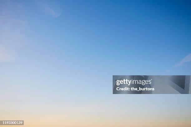 full frame shot of blue sky during sunset, color gradient and abstract background - sky background stock-fotos und bilder