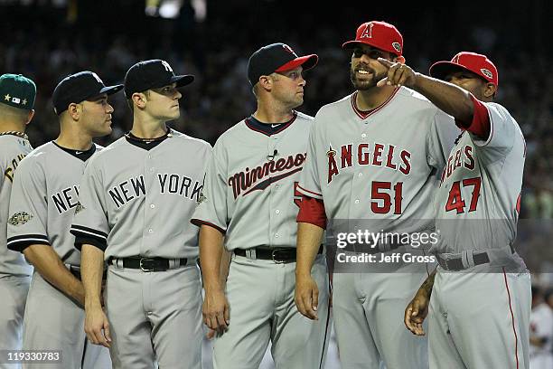 American League All-Star Jordan Walden of the Los Angeles Angels stands with American League All-Star Howard Kendrick of the Los Angeles Angels...