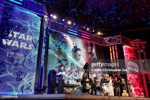 Katherine Kennedy, J.J. Abrams, John Boyega, Daisy Ridley, Oscar Isaac and Anthony Daniels with Star Wars characters Stormtroopers, Kylo Ren, R2-D2,...