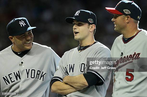 American League All-Star Russell Martin of the New York Yankees and American League All-Star David Robertson of the New York Yankees stand with...