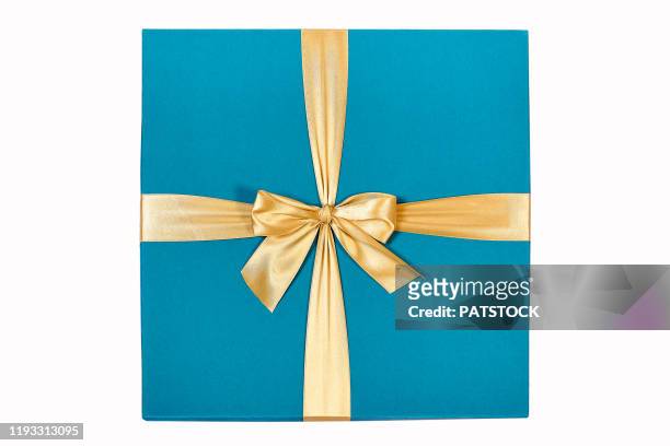 elegant blue cardboard gift box with a golden bow - gift ribbon imagens e fotografias de stock