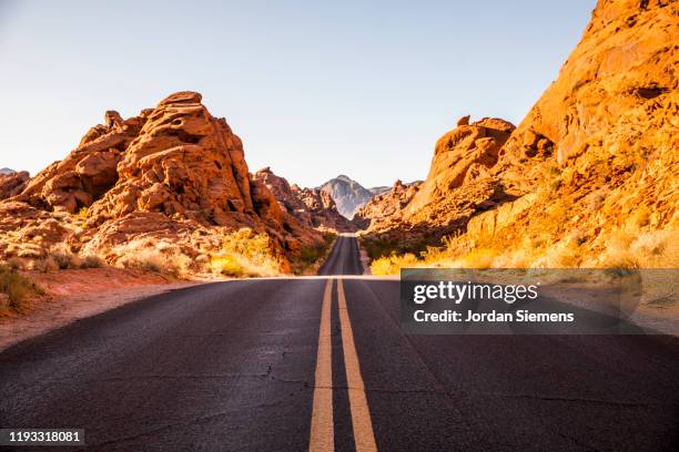 a scenic road in the desert - desert road stock pictures, royalty-free photos & images