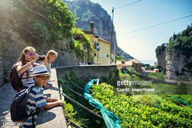 family looking at the view near amalfi - amalfi hike stock pictures, royalty-free photos & images