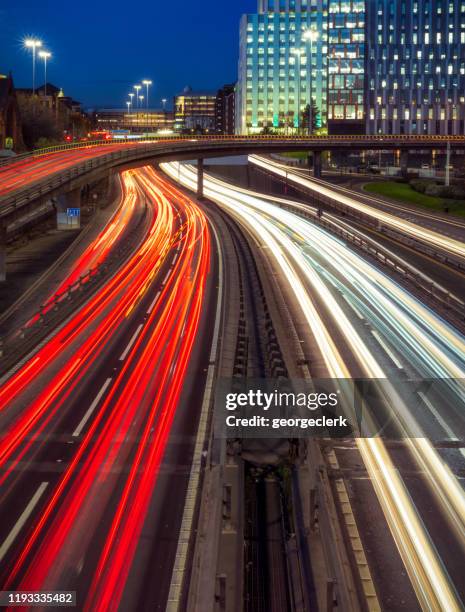 rush hour traffic in glasgow - motorway uk stock pictures, royalty-free photos & images