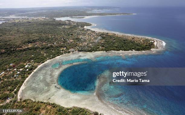 An aerial view of the coastline on December 07, 2019 in Port Vila, Vanuatu. Satellite data show sea level has risen about 6mm per year around Vanuatu...