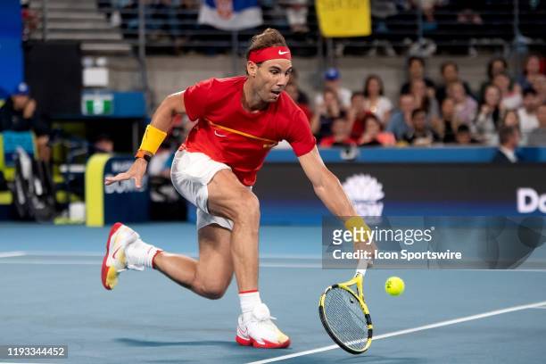 Rafael Nadal of Spain hits a low shot during day ten of the singles finals at the 2020 ATP Cup Tennis at Ken Rosewall Arena on January 12, 2020 in...