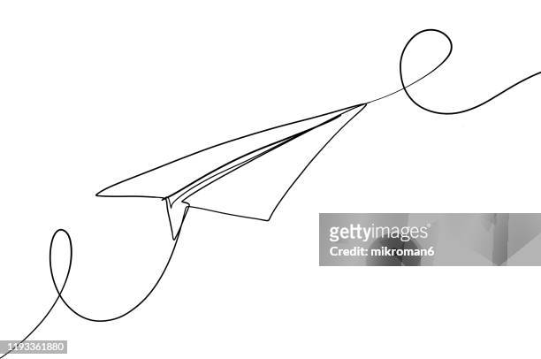 single line drawing of paper plane - doodling stock pictures, royalty-free photos & images