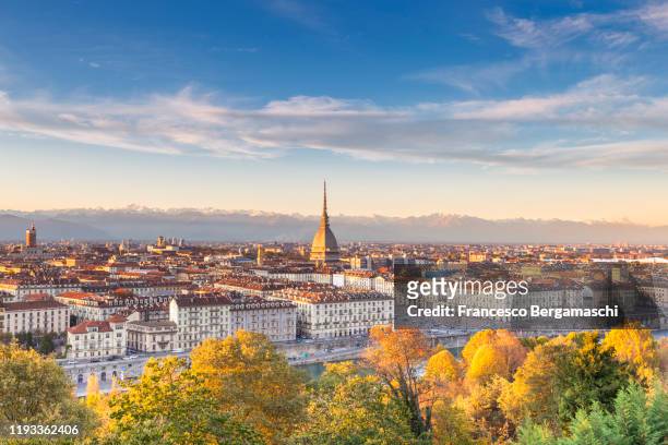 sunset on the old town of torino(turin) - turin stock pictures, royalty-free photos & images