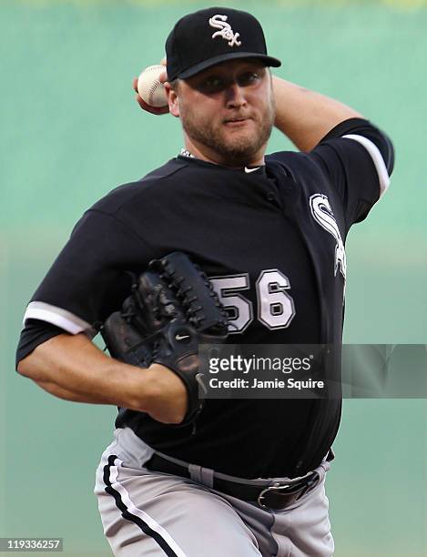 Starting pitcher Mark Buehrle of the Chicago White Sox warms up just prior to the start of the game against the Kansas City Royals on July 18, 2011...