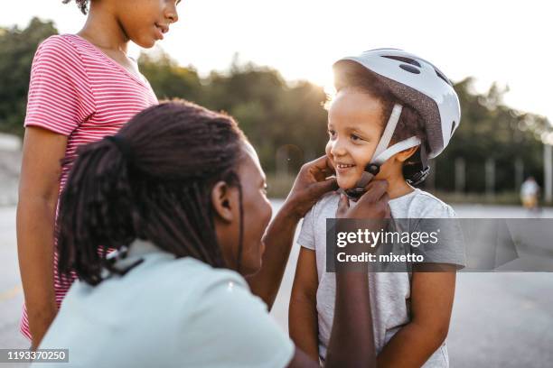 safety on first place - cycling helmet stock pictures, royalty-free photos & images