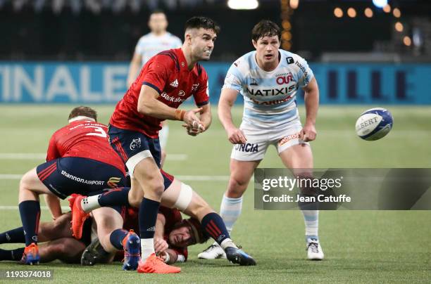 Conor Murray of Munster, Henry Chavancy of Racing 92 during the Heineken Champions Cup Round 5 match between Racing 92 and Munster Rugby at Paris La...