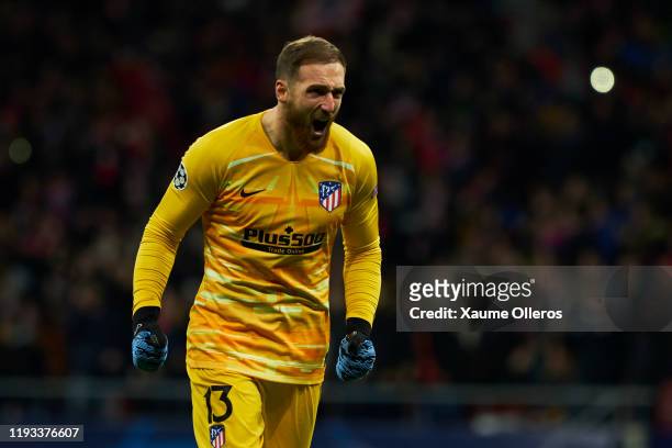 Goalkeeper Jan Oblak of Atletico de Madrid celebrates after his team's first goal scored by teammate Joao Felix during the UEFA Champions League...