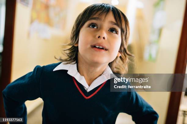 elementary age schoolboy portrait - cute cheer uniforms stock pictures, royalty-free photos & images