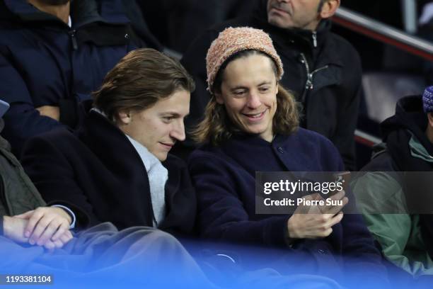 Jean and Pierre Sarkozy are seen during the UEFA Champions League group A match between Paris Saint-Germain and Galatasaray at Parc des Princes on...