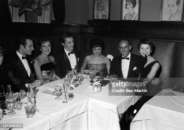Jerome Robbins, Chita Rivera, Lee Beckers at Sardi's opening night party for West Side Story, September 26, 1957