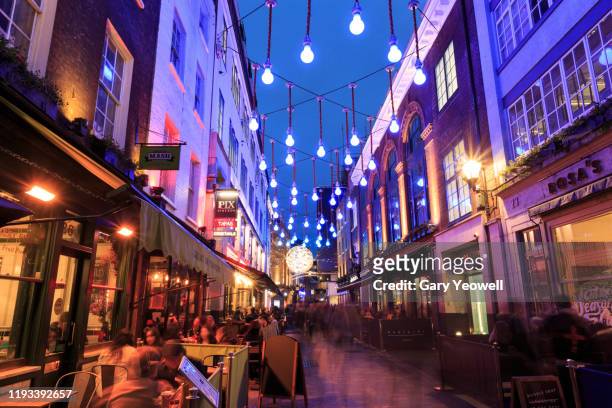 christmas in london - soho london night stock pictures, royalty-free photos & images